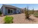 Backyard featuring gravel landscaping and patio, offering a blank canvas at 5240 E Gummite Dr, San Tan Valley, AZ 85143