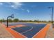 Community basketball courts with basketball hoops for outdoor fun at 5240 E Gummite Dr, San Tan Valley, AZ 85143