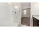 This bathroom offers an enclosed shower and a view of the bedroom and vanity area at 5240 E Gummite Dr, San Tan Valley, AZ 85143
