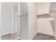 This walk-in closet features ample storage space with rods and shelving at 5240 E Gummite Dr, San Tan Valley, AZ 85143