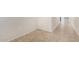 Neutral-toned hallway with hard surface floors, baseboards, and outlets at 5240 E Gummite Dr, San Tan Valley, AZ 85143