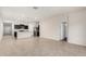 Open floor plan with a view of the kitchen featuring stainless steel appliances at 5240 E Gummite Dr, San Tan Valley, AZ 85143