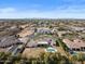 An aerial view of the luxurious community, boasting tree-lined streets and meticulously landscaped properties in a serene environment at 5827 S Marin Ct, Gilbert, AZ 85298