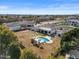 Expansive backyard with a private pool, manicured lawn, and covered patio perfect for outdoor entertaining and relaxation at 5827 S Marin Ct, Gilbert, AZ 85298