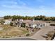 Wide aerial view shows home, surrounding neighborhood, and attached three-car garage at 5827 S Marin Ct, Gilbert, AZ 85298