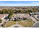 Scenic aerial view of well-maintained property with lush landscaping and circular driveway at 5827 S Marin Ct, Gilbert, AZ 85298