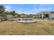 Expansive backyard with a pristine swimming pool, covered patio, and lush landscaping perfect for outdoor enjoyment at 5827 S Marin Ct, Gilbert, AZ 85298