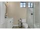 Updated bathroom featuring stand up shower with glass doors and white vanity at 5827 S Marin Ct, Gilbert, AZ 85298