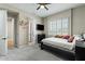 Bright bedroom with a built-in basketball hoop, tv, window shutters, and a neutral color scheme at 5827 S Marin Ct, Gilbert, AZ 85298
