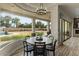 Bright breakfast nook featuring a round table, large windows, and a view of the backyard and pool at 5827 S Marin Ct, Gilbert, AZ 85298