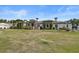 Expansive single story home featuring manicured landscaping and architectural details at 5827 S Marin Ct, Gilbert, AZ 85298