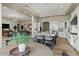 Bright, spacious kitchen with an island, stainless steel appliances, and open floor plan into the living room at 5827 S Marin Ct, Gilbert, AZ 85298