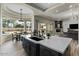 Bright and airy kitchen with a large island, perfect for entertaining, opening to Gathering room at 5827 S Marin Ct, Gilbert, AZ 85298