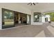 Covered patio with seamless indoor/outdoor living, leading to the expansive backyard at 5827 S Marin Ct, Gilbert, AZ 85298
