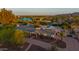 Aerial shot showcasing a pool and large desert landscaped yard at 6231 E Desert Cove Ave, Scottsdale, AZ 85254