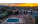 A large private backyard with a pool, shed, and mature landscaping at 6231 E Desert Cove Ave, Scottsdale, AZ 85254