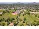 Aerial view of community park featuring sports fields, parking, playground and mature landscaping at 6231 E Desert Cove Ave, Scottsdale, AZ 85254