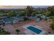 A stunning backyard featuring a pool and lush greenery, perfect for outdoor living at 6231 E Desert Cove Ave, Scottsdale, AZ 85254