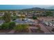 Aerial view of the property showing a pool and lush landscaping at 6231 E Desert Cove Ave, Scottsdale, AZ 85254