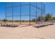Baseball field with bench seating ready for fans, on a bright sunny day at 6231 E Desert Cove Ave, Scottsdale, AZ 85254