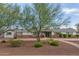 Charming single-story home featuring a well-manicured front yard and walkway under a picturesque sky at 6231 E Desert Cove Ave, Scottsdale, AZ 85254