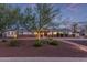 Charming single-story home featuring a well-manicured front yard and walkway under a picturesque sky at 6231 E Desert Cove Ave, Scottsdale, AZ 85254