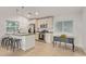 Kitchen features stainless steel appliances, tile floors, and breakfast bar at 6231 E Desert Cove Ave, Scottsdale, AZ 85254