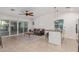 Open floor plan features living room, kitchen, and sliding glass door at 6231 E Desert Cove Ave, Scottsdale, AZ 85254