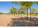Community playground with swings and shade trees offering a fun recreational space at 6231 E Desert Cove Ave, Scottsdale, AZ 85254