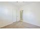 This bedroom features a ceiling fan, neutral paint colors, and standard sliding-door closet at 6317 S Kimberlee Way, Chandler, AZ 85249