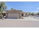Inviting single-story home with a two-car garage, well-maintained landscaping and a cozy, covered entry at 6317 S Kimberlee Way, Chandler, AZ 85249