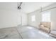 Spacious garage with neutral paint, concrete floor, and natural light, perfect for parking and storage at 6317 S Kimberlee Way, Chandler, AZ 85249