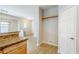 Walk-in pantry located just off the kitchen featuring wood-look tile flooring at 6317 S Kimberlee Way, Chandler, AZ 85249