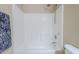 This bathroom features a standard white tub and shower combination at 6317 S Kimberlee Way, Chandler, AZ 85249