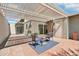 Inviting back patio showcases comfortable seating under a stylish pergola, perfect for entertaining at 6629 N Majorca E Way, Phoenix, AZ 85016