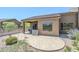 Cozy back patio featuring neutral tile and a covered outdoor dining area at 7094 E Palo Brea Dr, Gold Canyon, AZ 85118