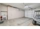 Spacious garage with custom cabinetry and a golf cart at 7094 E Palo Brea Dr, Gold Canyon, AZ 85118