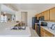 Open kitchen with modern appliances and views to the dining and living area at 7094 E Palo Brea Dr, Gold Canyon, AZ 85118