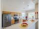 Well-equipped kitchen with stainless appliances and ample counter space, open to the living areas at 7094 E Palo Brea Dr, Gold Canyon, AZ 85118