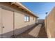 Side view of the property with desert landscaping, and walkway at 7101 N 36Th Ave # 102, Phoenix, AZ 85051
