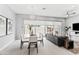Inviting dining area with modern chandelier and sliding doors leading to the patio at 7472 E Paraiso Dr, Scottsdale, AZ 85255