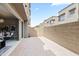 Cozy outdoor patio with brick pavers and a view of the townhome exteriors at 7472 E Paraiso Dr, Scottsdale, AZ 85255