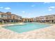 Stunning pool with a jacuzzi, ramada and lounge chairs offers a relaxing community space at 7472 E Paraiso Dr, Scottsdale, AZ 85255