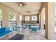 Outdoor dining area under a ramada offers a relaxing gathering spot with comfortable seating and grills at 7472 E Paraiso Dr, Scottsdale, AZ 85255