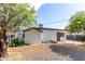 The home's backyard offers ample space and a stucco wall at 8132 E 3Rd Ave, Mesa, AZ 85208