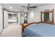 View of a bedroom featuring an open closet and ensuite bathroom at 8132 E 3Rd Ave, Mesa, AZ 85208