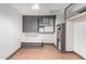 Walk-in closet with built-in shelves, drawers, and ample storage space at 8132 E 3Rd Ave, Mesa, AZ 85208