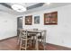 Cozy dining room with modern light fixture and decorative wall art at 8132 E 3Rd Ave, Mesa, AZ 85208