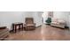 Spacious living room featuring wood laminate floors and comfortable seating at 8132 E 3Rd Ave, Mesa, AZ 85208