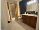 Bathroom featuring shower with tub and vanity with modern fixtures at 9451 E Becker Ln # 1051, Scottsdale, AZ 85260